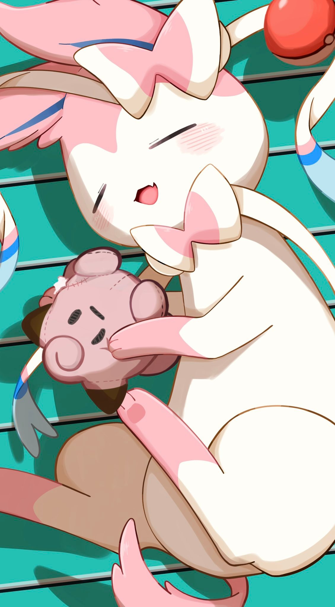 Sylveon holding a Poke Doll (essentially a Clefairy plushie). Sylveon holding a Poke Doll (essentially a Clefairy plushie).