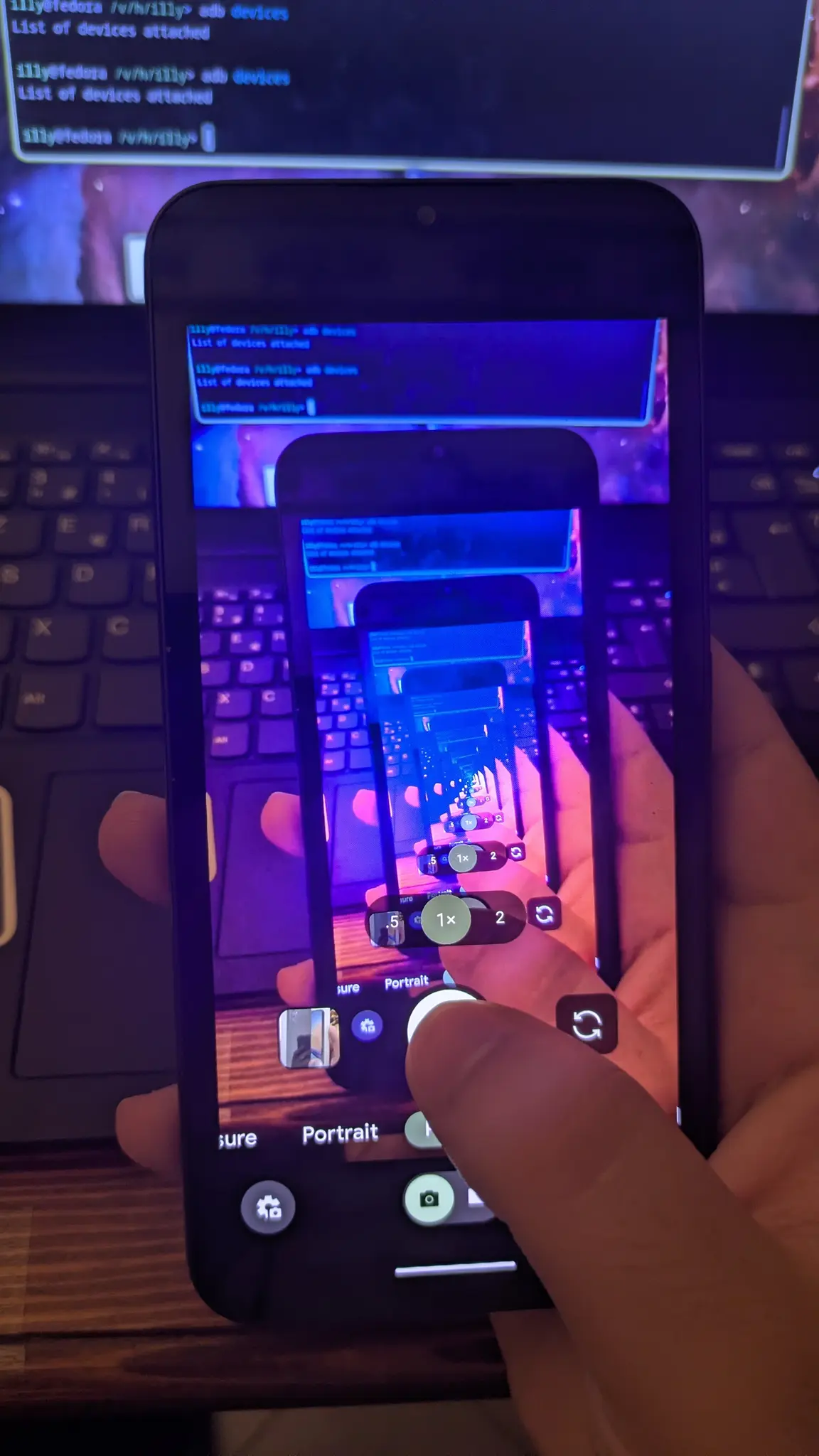 me using scrcpy for android to remote control my broken screen phone using my samsung phone and using that to take a picture of the samsung that's showing the screen of the pixel, creating a very trippy image lol
